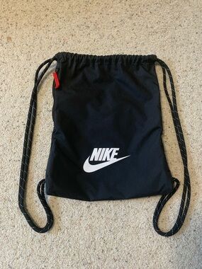 Nike Black Drawstring Sack with White Logo and Red Tab